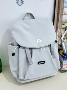Lightweight grey canvas backpack for women, casual Japanese style daily commute school bag travel.