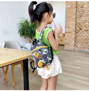 Cute toddler dinosaur backpack with anti-lost strap, ideal for baby boys and girls daily use.