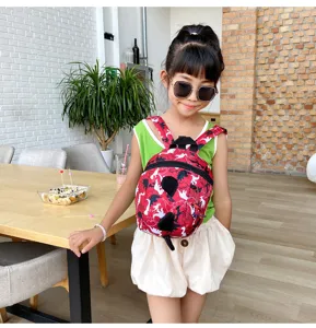 Toddler dinosaur backpack detail view, cute print design with anti-lost strap for daily use.
