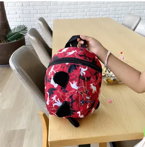 Toddler dinosaur anti-lost backpack, cute cartoon print school bag for 1-3 years old kids.