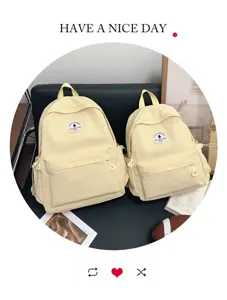 Gran mochila escolar amarilla, diseño liso simple para estudiantes y desplazamientos diarios.