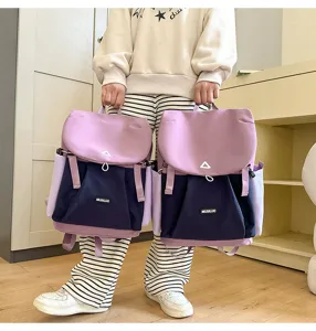 Detail view of casual colorblock backpack, large capacity school bag for daily use.