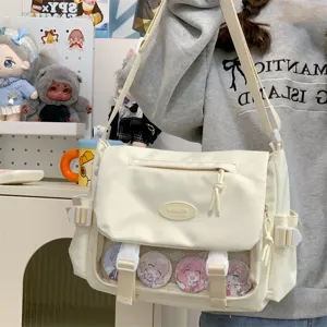 Cute college style canvas messenger bag with transparent window for ita badges and pins.