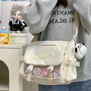 Cute Japanese style canvas messenger bag with transparent ita window for anime badges and daily use.