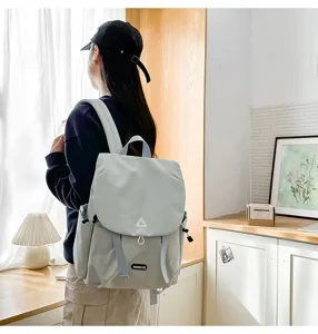 Detailed view of women casual backpack, lightweight travel daypack with front flap and straps.