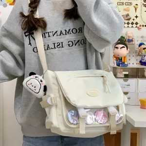 Japanese style cute canvas messenger ita bag with transparent pocket for student daily use.