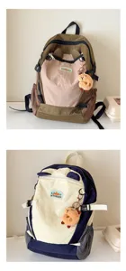 Detailansicht des farbblockierenden Kinderrucksacks, leicht mit niedlichem Anhänger.