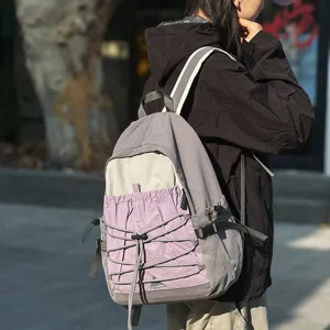 Casual outdoor travel backpack with drawstring pocket, lightweight daypack for hiking sports.