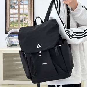 Japanese casual black backpack for women, lightweight nylon school bookbag for daily commute.