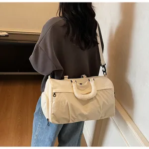 Large capacity travel duffel bag for women, lightweight waterproof gym sports shoulder bag.