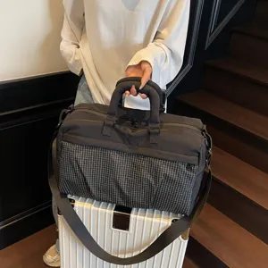 Large capacity travel duffel bag for women, stylish lightweight shoulder gym bag for short trips.