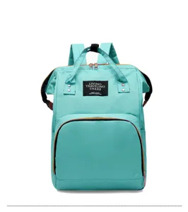 Waterproof multi-functional mommy diaper backpack with large capacity and stylish design.