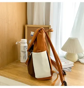 Casual women's backpack, stylish color-block design, large capacity travel school bag, lightweight.