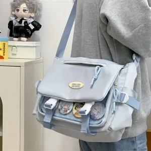 Cute Japanese college style messenger ita bag with clear window for pins, large capacity blue.