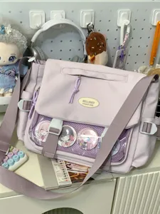 Cute Japanese college style ita bag messenger bag with transparent pin window and wide strap.