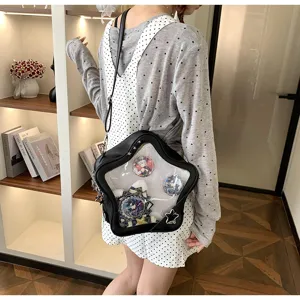 Detail view of Japanese sweet cool style star transparent ita bag with cute anime badges.