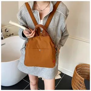 Stylish brown casual backpack for daily commute, multi-functional design with ample space.