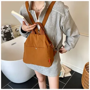 Stylish casual brown backpack for women, multi-functional daily commuting travel bag.