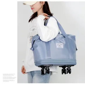 Close-up details of the large capacity travel duffel bag with smooth universal wheels.