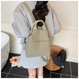 Minimalist versatile commuter backpack with stylish candy color and multi-functional storage.