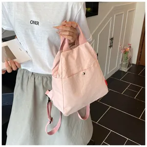 Stylish pink multi-functional canvas backpack for women, casual candy color travel daily commuter bag
