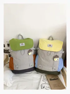 Casual color-blocked backpack for daily outdoor travel, lightweight and stylish daypack.