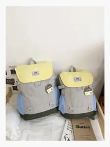 Casual colorblock backpack set for couples, lightweight travel daypack with multiple pockets.