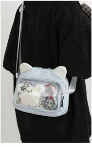 Cute Japanese style ita bag with cat ears and clear window for anime pins and plushies.
