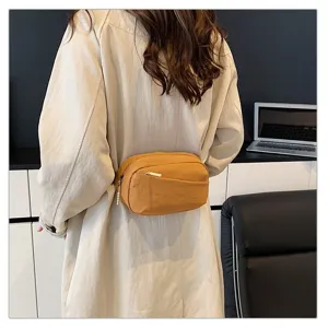 Korean style nylon waist bag for women, casual chest crossbody bag with zipper pocket.