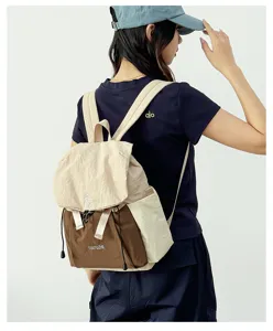 Light Japanese style casual backpack, minimalist nylon design for outdoor travel and daily use.