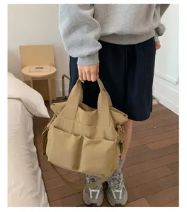Casual nylon tote bag for women, large capacity shoulder handbag for daily commute.