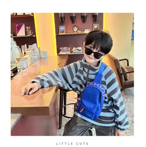 Stylish kids canvas chest bag, cool blue single shoulder crossbody bag for boys detail view.