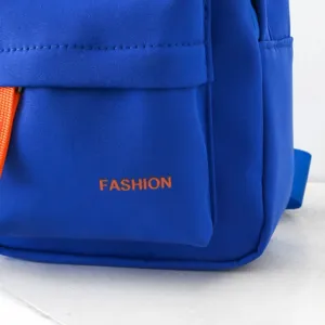 Detailed view of kids blue chest bag pocket, orange strap, fashion print, close up.