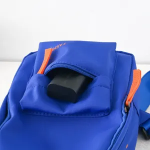 Blue kids chest bag detail featuring vibrant orange straps, front zipper pocket design.