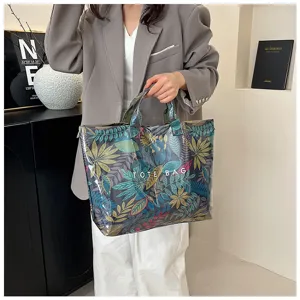 Transparent PVC plant print tote bag detail, large capacity summer beach casual handbag.