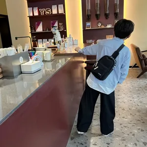Trendy Korean style children's black chest bag, minimalist single shoulder crossbody bag for boys.