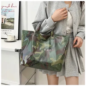 Waterproof PVC camo tote bag for women, large capacity casual vacation handbag and shopper.