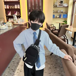 Trendy kids chest bag, minimalist canvas crossbody bag for boys, stylish shoulder bag details.