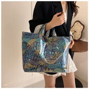 Transparent PVC botanical print tote bag, large capacity waterproof handbag for summer use.