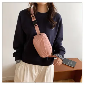 Korean style nylon chest bag for women, fashion casual crossbody waist bag for outdoor travel.