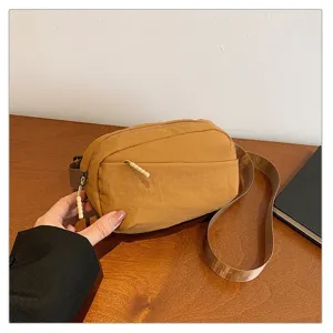 Casual nylon waist bag and crossbody chest bag for women and men, perfect for outdoor travel.