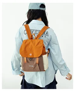 Detailed back view of the colorblock lightweight casual backpack in outdoor camping style.