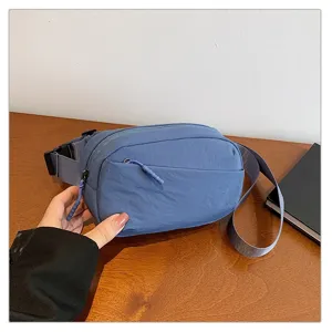 Blue nylon waist bag for women and men, casual chest bag and cross-body bag for travel.