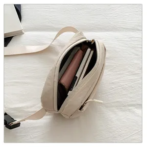 Detailed view of a casual nylon waist bag and chest bag with zipper pocket and strap for travel.