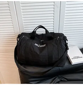 Grand sac de voyage noir grande capacité, sac de sport léger pour fitness et loisirs en plein air.
