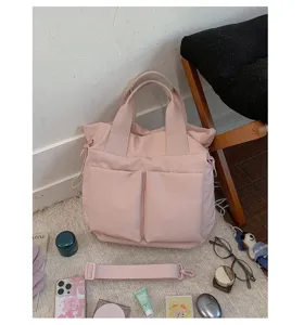 Pink nylon tote bag for women, large capacity casual shoulder bag and daily crossbody bag.