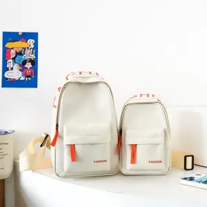 Details of stylish children's chest backpack in cream white with orange zipper pullers.