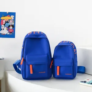 Trendy children's blue chest backpack with orange straps, stylish and minimalist everyday bag.