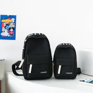Detailed view of the black casual chest backpack set featuring compact design and durable material.
