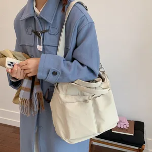 Casual nylon tote bag for women, large capacity shoulder bag and crossbody bag for daily commute.